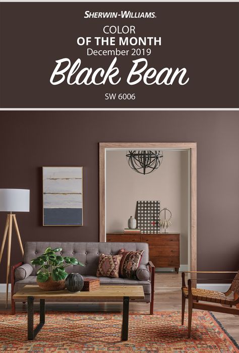 Looking for a Sherwin-Williams wall color versatile enough to bring unity to rooms that feature a variety of wood accents? The deep, dark December Color of the Month is it. Black Bean SW 6006 pulls together trim, floors and décor for a grounded and earthy vibe you can relax into after a long day at work. For more color inspiration, stop by your nearest store and ask Sherwin-Williams. #colorofthemonth #december #sherwinwilliams #colorinspiration #paintinspiration #design #decor #boho #modern Accent Wall Paint Colors, Brown Accent Wall, Brown Paint Colors, Color Of The Month, Trending Paint Colors, Paint Color Inspiration, Neutral Paint Color, Accent Walls In Living Room, Sherwin Williams Paint Colors