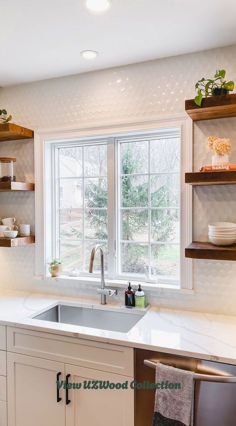 A kitchen sink area with a window surrounded by a tile wall with floating wood shelves. Kitchen Shelves Around Window, Floating Shelves Around Window, Shelves Around Window, Drawer Microwave, Kitchen Window Shelves, Kitchen Sink Area, Wall Floating Shelves, Floating Wood Shelves, Kitchen Floating Shelves