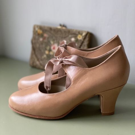 Charlotte is the name of this cute 1920s-style everyday shoe. It features a wide grosgrain ribbon shoe lace for closure and a slightly curved heel, making it so feminine. Here, you see the cream-colored version—it is also available in cognac brown. #memery #memeryshoes Ribbon Shoe Laces, Everyday Shoe, 1920s Style, Everyday Shoes, 1920s Fashion, Shoe Lace, The Cream, Vintage Shoes, Back In The Day