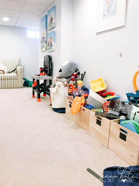 These simple tips and ideas will help you to organize and declutter all the toys, games and other bits and pieces in your kids playroom. Big Toys Storage Ideas, How To Organize Big Toys, How To Organize Large Toys, Best Toy Storage Ideas, How To Organize Kids Toys, Big Toy Storage Ideas, Basement Toy Storage, Toy Room Storage Ideas, Toy Truck Storage Ideas