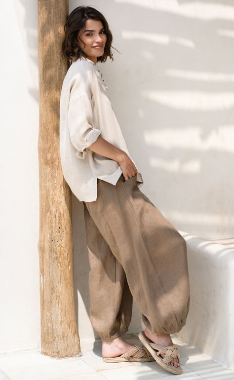 Sustainably crafted from luxury French linen, our ultra-soft Sadhu pants offer a relaxed, billowy silhouette and tapered hem. A stylish, everyday essential that boasts functionality with both front and back pockets, plus a figure-flattering elasticised waistband for ultimate comfort. The perfect partner for any piece in our kindred top collection. 100% Oeko-Tex® French linen Relaxed, billowy silhouette Tapered hemline Elasticated waistband Functional front and back pockets Ethically made in Bali Relaxed Trousers, Palazzo Trousers, Womens Wide Leg Pants, French Linen, Clothing Hacks, Fall Fashion Trends, Linen Pants, The Label, Linen Blend