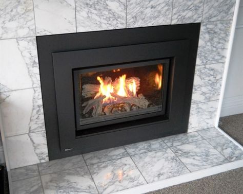 gas fireplace insert with marble surround Gas Fireplace Surround Ideas, Tile For Fireplace Surround, Gas Fireplace Surround, Diy Fireplace Surround, Glass Tile Fireplace, Tile For Fireplace, Fireplace Surround Ideas, Log Burner Fireplace, Contemporary Fireplace Designs