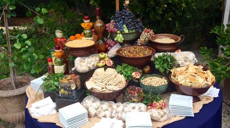 Mediterranean Mezze Station featured on PureJoyCatering.com Mediterranean Catering Display, Mediterranean Mezze, Carving Station, Wedding Caterer, Marinated Olives, Red Pepper Hummus, Catering Display, Catering Ideas, Patio Party