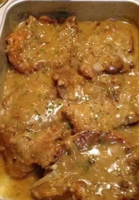 Homemade Recipes Braised Pork Chops, Smothered Pork Chops Recipe, Pork Gravy, Pork Crockpot Recipes, Smothered Pork, Seared Pork Chops, Cajun Pasta, Gravy Ingredients, Smothered Pork Chops