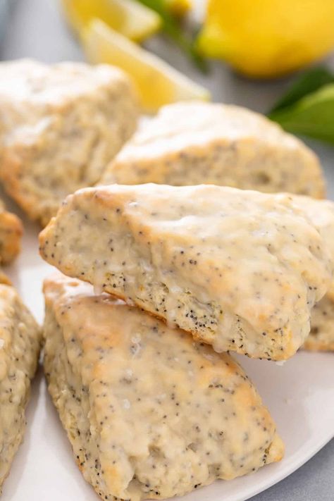 Lemon Poppy Seed Scones - My Baking Addiction Lemon Poppy Seed Scones Recipe, Lemon Poppy Scones, Lemon Poppyseed Scones Recipe, Lemon Raspberry Scones, Lemon Poppyseed Scones, Almond Poppyseed, Lemon Poppy Seed Scones, Lemon Poppy Seed Cookies, Vanilla Bean Scones