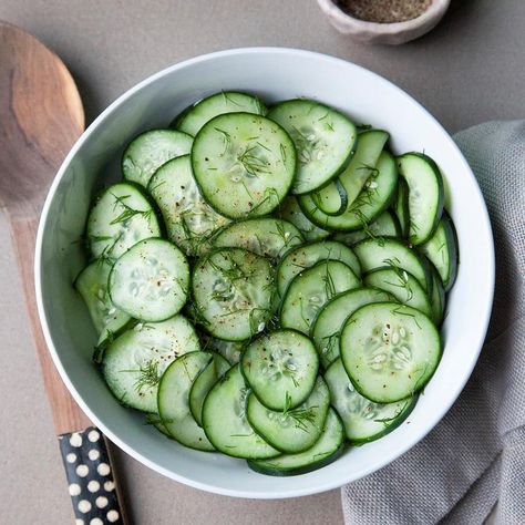 Sprinkling cucumber slices with salt and letting them stand in a colander draws out excess water so they stay crisp when set on a barbecue buffet. Try this cucumber dill salad alongside any grilled entree. —Taste of Home Test Kitchen Filled Cucumbers, Cucumber Dishes, Pansy Cards, Salads For Picnics, Deviled Egg Potato Salad, Dill Salad, Salad Appetizer Cups, Cucumber Dill Salad, Dill Recipes