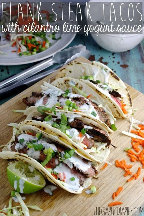 Flank Steak Tacos with Cilantro Lime Yogurt Sauce Flank Steak Tacos, Marinated Flank Steak, Flank Steak Recipes, Steak Tacos, Pork Steak, Mexican Foods, Yogurt Sauce, Skirt Steak, Flank Steak