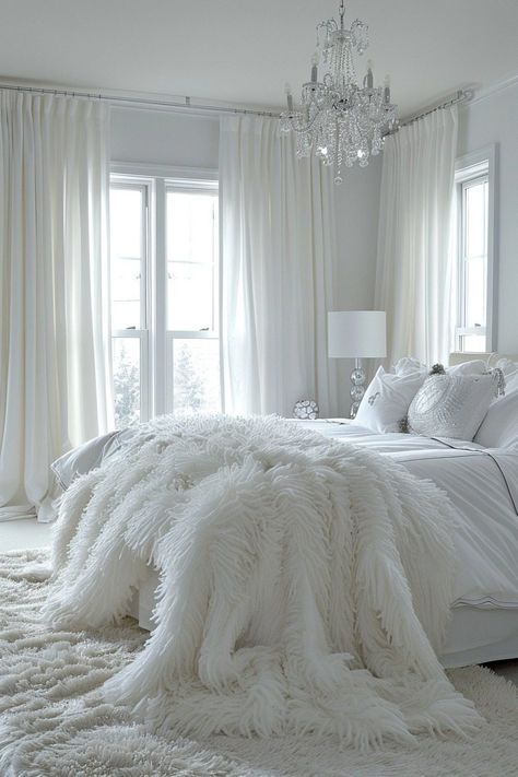 29 Summer Bedroom Decor Ideas for a Refreshing Seasonal Update 17 Silver White Aesthetic, Romantic White Bedroom, White Fluffy Bed, White Bedroom Interior, White Fluffy Bedding, White And Silver Bedroom, White Bedroom Cozy, Silver Bedroom Decor, White Curtains Bedroom