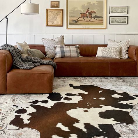 Leather Couch With Cowhide Rug, Cowhide Ruggable, Ruggable Cowhide Rug, Ruggable Cowhide, Cow Hide Living Room Decor, Cow Hide Rug Living Room Modern, Western Modern Bedroom, Cow Hide Rug Living Room, Hide Rug Living Room