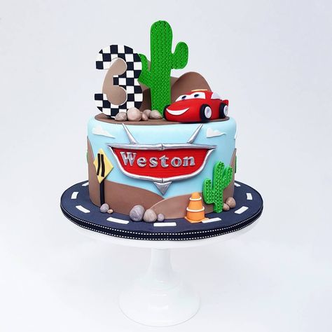 Lightning McQueen Cars Cake | Eini & Co. Pixar Cars Smash Cake, Cars Cartoon Cake, Cars Cake For Boys, Cake Lightning Mcqueen, Cars Torte, Mcqueen Car Cake, Car Cakes For Men, Car Cakes For Boys, Disney Cars Theme