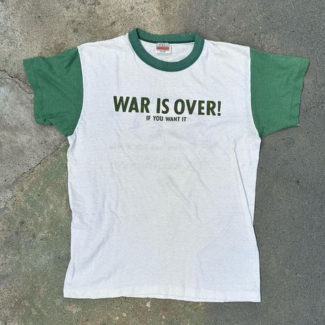 @madcapmysteriesvintage on Instagram: "SOLD War Is Over If You Want It Dm for inquiries . . #thrift #vintage #vintageforsale #foundongrailed #grailed #80s #bandtee #vintagetee #70s #vintagedenim #60s #hippy #vintagesweatshirt #vintagelevis #vintageclothingforsale #1960s #mod #1970s #vintagetees #vintageclothesforsale #hiddenny #hippy #rocknroll #woodstock #highsnobiety #1960sfashion #1970sfashion #1980sfashion #vintagefashion #curatedvintage" Vintage Tshirts 70s, 70s Tshirt, Hippie Tshirt, Beatles Vintage, 1980’s Fashion, 1960’s Fashion, The Baby Sitters Club, Black Anime Guy, Thrift Vintage