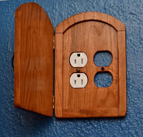 This is an outlet cover door. It is made of Stained cherry wood and is ready to cover your outlets. The door opens and closes. This cover will fit most outlets and replaces the original cover plate. The cover is roughly 8 inches by 5 1/4 inches. The outlet itself is not included just the door. This is the door you will receive. Wood Outlet Covers, Diy Light Switch Cover Ideas, Floor Outlet Cover, Light Switch Plate Cover, Switch Plate Covers, Outlet Covers, Light Switch Covers, House Room, Light Covers