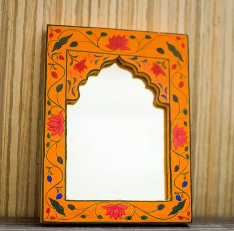 handpainted mirror frame natural color size 8*6inch includes mirror mdf board hanging option customise option available can see more option on our instagram page arts.divya_home_decor Hand Painted Mirror Frame, Painted Mirror Frame, Hand Painted Mirror, Painting Mirror Frames, Wall Decor Mirror, Hand Painted Mirrors, Painted Mirror, Fiber Necklace, Decor Mirror