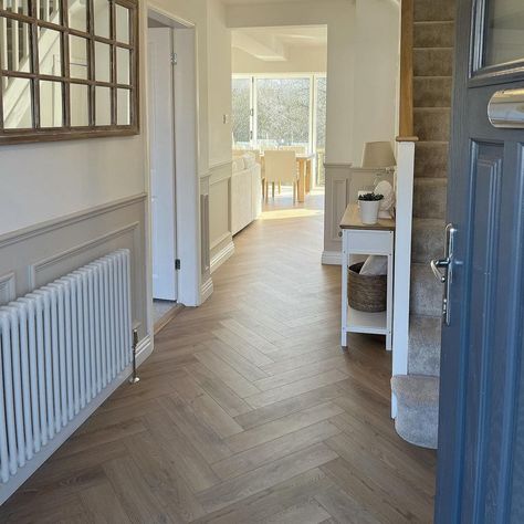 Sahara Oak 5mm Herringbone Waterproof Click Vinyl Show Home Interiors Uk, Heron Bone Flooring, Long Living Room Inspiration, Herringbone Hallway Floor, Herringbone Carpet Living Room, Newbuild House Interiors, Oak And White Staircase, Hall Flooring Ideas, Floorboards Living Room