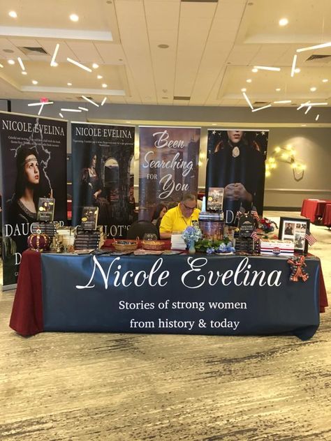 Fabulous table by author Nicole Evelina, manned by her able assistant! https://nicoleevelina.com/ Book Signing Table Ideas, Career Fair Table Ideas, Author Book Signing Aesthetic, Book Signing Table Ideas Author, Author Table Display Ideas, Book Signing Event Ideas, Book Signing Aesthetic, Book Signing Party, Signing Ideas