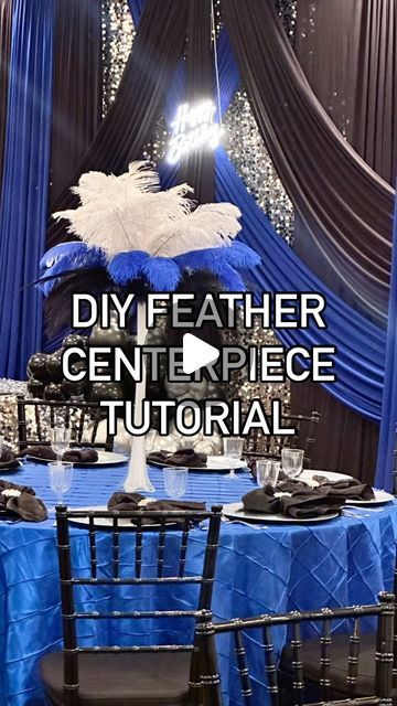 Melanie Turner on Instagram: "Decorate with me as I share step-by-step instructions on how to create a beautiful wedding, baby shower, bridal shower, or birthday party centerpiece using feathers.  This will also work with pampas grass.  Please see the list of items that you need to make this centerpiece below:  ❤️ Feathers (I used black, white and royal blue): 12 of each color  ❤️ 10- 24” Vases ❤️ 10- Bouquet holders ❤️ 10- Royal Blue Pin-tuck Linens ❤️ 50- Napkins *Amazon links in bio are affiliate #livingluxuriouslyforless #feathercenterpieces #diy #graduation #birthdayparty #birthdaypartydecor" Navy Blue And Gold Floral Arrangements, Black And Blue Centerpiece Ideas, Royal Blue Centerpiece Ideas, Royal Blue Centerpieces, Masquerade Party Themes, Melanie Turner, Grass Centerpiece, Ostrich Feather Centerpieces, Gala Decorations