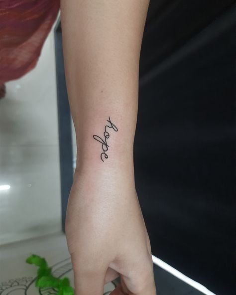 A hope tattoo symbolizes optimism, perseverance, and the belief in a brighter future. It often serves as a reminder to stay positive and resilient through difficult times. Inked by @deepesh.gehlod Contact -7566005533. - #HopeTattoo - #TattooMeaning - #InkedWithHope - #TattooArt - #InkInspiration - #TattooDesign - #HopefulInk - #TattooedWithHope - #HopeInspiration - #TattooCommunity Hope Tattoos, Handwritten Tattoo, Hope Tattoo, Hope Inspiration, Difficult Times, Stay Positive, Bright Future, Tattoos With Meaning, Staying Positive