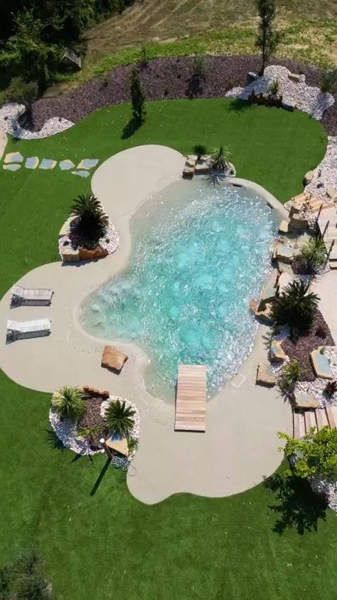 Thomas Nuancesdó Beach Entry Pools Backyard, Man Made Beach Backyard, Beach In Backyard, Beach Pools Backyard, Lagoon Pool Backyard, Backyard Lagoon, Beach Entrance Pool, Sand Pool, Pool And Jacuzzi