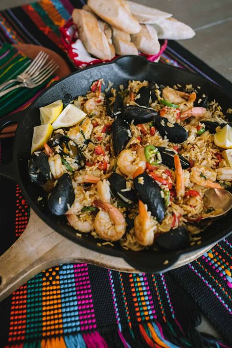 If you're looking to impress for your next date night, try making my Easy Seafood Paella! Made in under 30 minutes without a fancy pan, this recipe for my pescatarian-friendly mussel and shrimp paella de marisco is simple, elegant, and delicious. Mexican Paella Recipe, Homemade Paella, Spanish Seafood Paella, Shrimp Paella, Easy Paella, Paella Recipe Seafood, Mexican Seafood, Mussels Recipe, Delicious Seafood Recipes