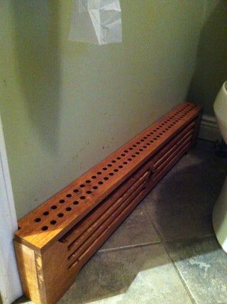 How to Make Wooden Baseboard Heater Covers. : 4 Steps - Instructables Dresser Over Baseboard Heater, Diy Wood Baseboard Heater Covers, Update Baseboard Heaters, How To Make Baseboard Heaters Look Better, Remove Baseboard Heater, Log Cabin Remodel, Baseboard Radiator, Floor Heater, Electric Baseboard Heaters