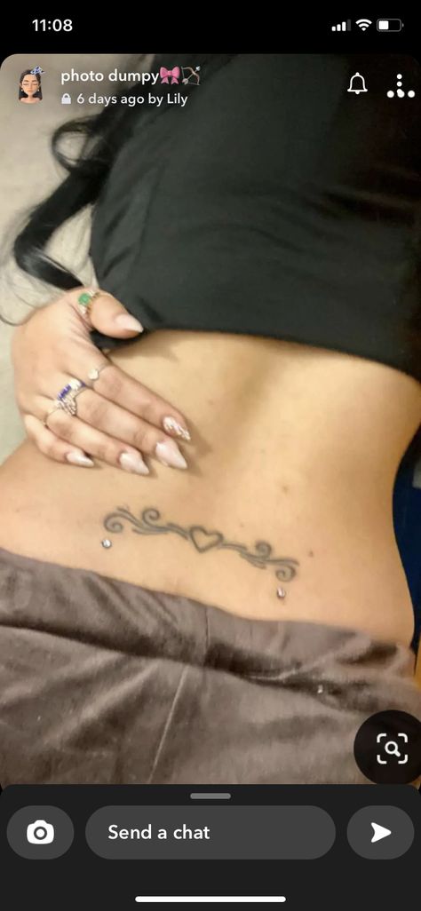 Spine Tattoos With Back Dermals, Back Pirsing, Back Dermals With Tattoo, Back Dermal Piercing With Tramp Stamp, Surface Back Piercing, Back Dimple Piercing With Tattoo, Lower Back Dermals, Lower Back Percinings, Tramp Stamp With Back Dermals