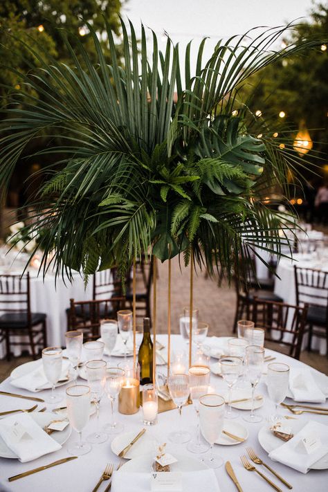 Miami Wedding Color Palette, Wedding Jungle Theme, Tall Vases Palm Leaves Wedding Tables, Dark Green Tropical Wedding, Tommy Bahama Wedding, Jungle Wedding Flowers, Emerald Black White Wedding, Palms Wedding Decor, Tropical Wedding Reception Table