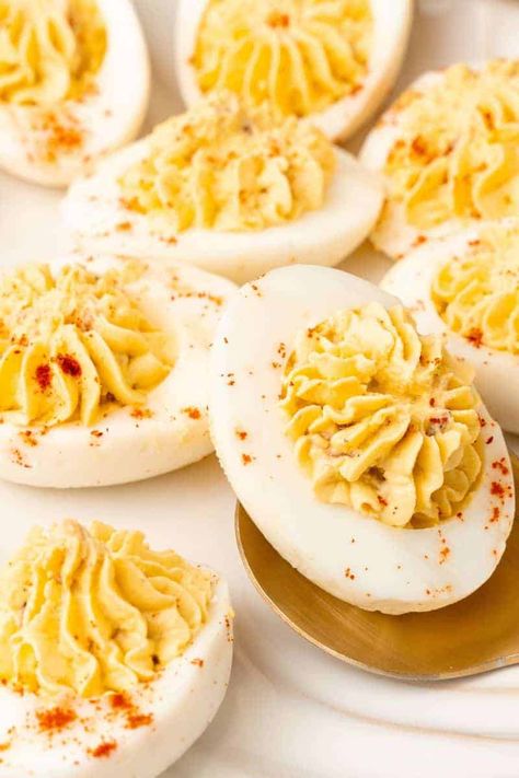 Try these Million Dollar Deviled Eggs at your next party for the perfect finger food. They are easy to make and can be prepared ahead of time, making them a convenient and stress-free appetizer. The secret to these delicious deviled eggs is the combination of creamy mayonnaise, tangy Dijon mustard, and crispy bacon! Easy Devil Eggs 4 Ingredients, Deviled Eggs No Vinegar, Million Dollar Eggs, Deviled Eggs Dijon Mustard, Deviled Eggs With Dijon Mustard, Sweet Deviled Eggs, Million Dollar Deviled Eggs, Deviled Eggs Recipe Best, Buffalo Deviled Eggs