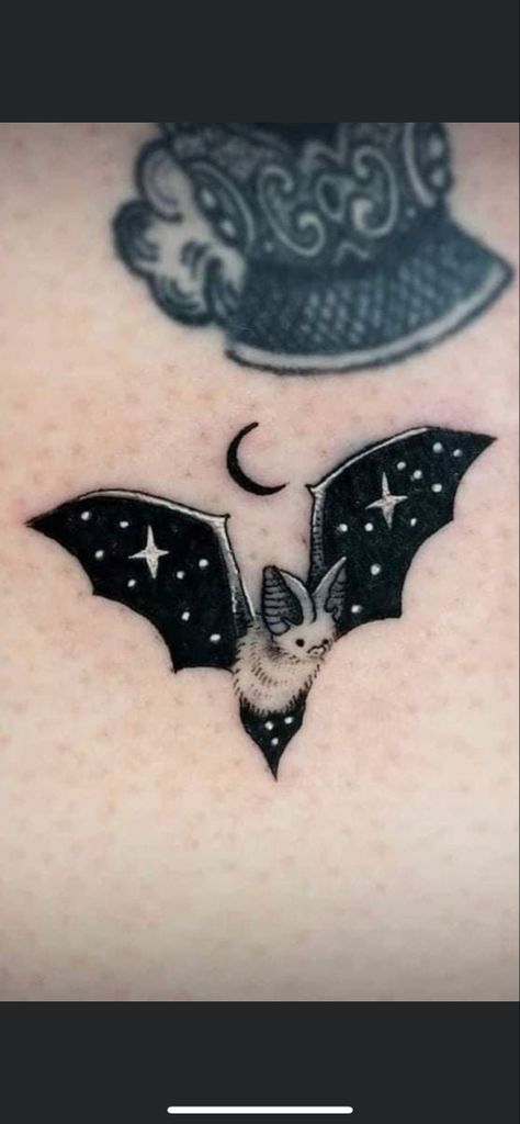 Cute star bat tat Galaxy Bat Tattoo, Spooky Wrist Tattoos For Women, Bat Tattoos Cute, Bat And Stars Tattoo, Mini Bat Tattoo Ideas, Bat Halloween Tattoo, Glitter Bat Tattoo, Bats And Stars Tattoo, Bat Ghost Tattoo