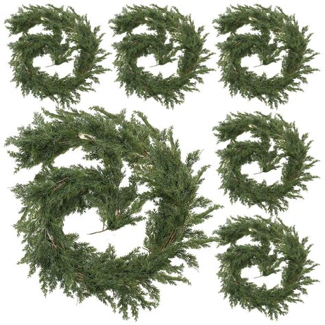 PRICES MAY VARY. What Can You Get: 6 pieces of 9ft long Christmas cedar garland, sufficient amount and length to meet your home or outdoor decoration needs, creating an intense festive atmosphere for your home Infuse a Festive Feeling: the leaves are layered so that the Christmas greenery garland looks layered and charming, full of the breathing of Christmas, will add charm to your house during the Christmas season Proper Size: each cypress garland artificial realistic is about 72 inches/ 183 cm Christmas Garland Staircase, Porch Garland, Archway Decor, Fireplace Table, Cypress Vine, Minimalist Holiday Decor, Cedar Garland, Christmas Dining Table Decor, Mantel Fireplace