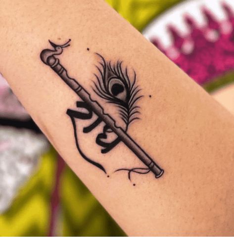 Krishna Tattoo Design Ideas Images God Krishna Tattoo Design, Flute And Feather Tattoo, Radha Tattoo Design, Basuri Krishna Flute Tattoo, Flute With Feather Tattoo Designs, Radha Krishna Tattoo On Hand, Krishna Related Tattoo, Radha Krishna Mehandi Design, Radha Krishna Mehendi Designs