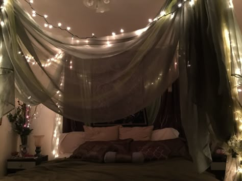 How To Hang Canopy Over Bed, Bed Canape Ideas, Sage Green Canopy Bed, Green Canopy Bed Curtains, Bed Tent Aesthetic, Canopy Bed Whimsigoth, Dark Bed Canopy, Tapestry Bed Canopy, Bed Canopy Corner