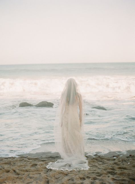 Beach Wedding Dress With Veil, Ocean Inspired Wedding Dress, Ethereal Beach Wedding, Vintage Beach Wedding Aesthetic, Ocean Wedding Pictures, Ocean Wedding Aesthetic, Mermaid Wedding Aesthetic, Coastal Wedding Photography, Beach Wedding Veils