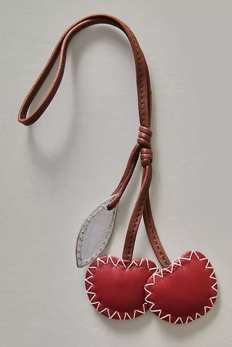 Bead Bag Charm, Leather Bag Charm, Bag Charm Trend 2024, Cherry Silhouette, Bag Charms Aesthetic, Bag Tag Design, Bag Accessories Keychain, Fabric Keychains, Bag With Charms