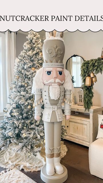 Kelsi Savage|| DIY + HOLIDAYS on Instagram: "🎄Nutcracker Paint Details🎄 ⁣ ⁣ Sharing some details on how I painted our giant nutcracker! The shimmer crystals are my favorite and now I want to use them on my entire house!⁣ ⁣ Paint colors: “passive” & “intellectual grey” by valspar⁣ Paint shimmer: Valspar Paint Crystals .⁣ .⁣ .⁣ .⁣ #diy #nutcracker #diychristmas #diychristmasdecor #christmasdecor #diychristmasdecorations #christmasdecorations #christmasdiy #christmas" Diy Outside Nutcracker, Holiday Time 75 Inch Nutcracker, Winter Wonderland Nutcracker, Tall Nutcracker Christmas, Holiday Time Nutcracker Makeover, Outdoor Nutcracker Decorations, How To Make A Giant Nutcracker, Neutral Color Nutcracker, Christmas Diy Nutcracker