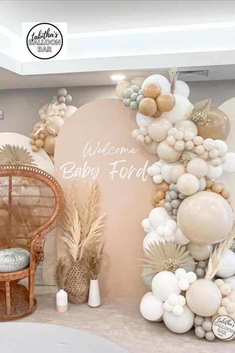 Boho baby shower vibes 😍 this installation used our #trendy Chiara walls w/personalization and we added pampas, palm leaves and florals to the neutral toned balloon garland ➡️swipe to see a closer pic Boho Neutral Balloon Arch, Balloon Arch With Palm Leaves, Pampas Balloon Garland, Boho Beach Balloon Garland, Balloon Arch Baby Shower Neutral, Boho Baby Shower Balloon Arch, Pampas Grass Balloon Garland, Baby Shower Ideas Boho Girl, Balloon Garland With Pampas