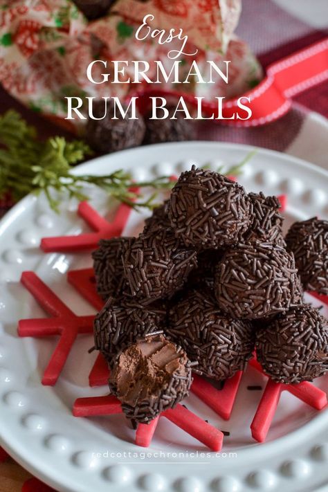 A white plate with a red snowflake and a pile of fudge German rum balls on top, with red ribbon swirling around it. German Chocolate Fudge, Fudge Balls, Desserts For Thanksgiving, Halloween Dessert Ideas, Desserts Halloween, Pumpkin Dessert Recipes, Valentines Desserts, Rum Balls, July Desserts