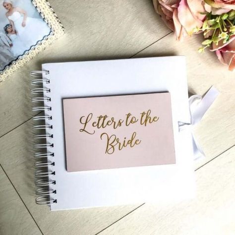 12 Best Wedding Gifts for Sister Getting Married | Emmaline Bride Letters For The Bride, Letters To The Bride Scrapbook, Wedding Gifts For Sister, Sister Getting Married, Letters To The Bride Book, Bride Scrapbook, Sentimental Wedding Gifts, Letters To The Bride, Sister Wedding Gift