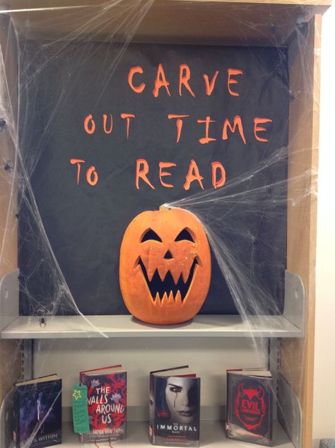 Carve Out Time For Reading, Pumpkin Library Display, Pun Bulletin Board Ideas, Library Book Drop Decoration, September Book Displays, Haunted Library Decorations, September Library Bulletin Board Ideas, Autumn Library Displays, Fall Book Displays Library