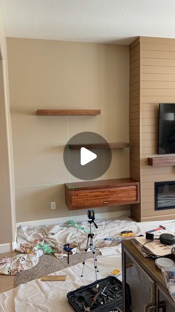 Accent Wall Designs - Chris on Instagram: "Installing these custom made floating shelves stained to match the store bought floating consoles.  Almost an identical match!  Used @mttrimco’s L-bracket mounting method that gives them SO much support.  These can take way more weight than they ever need to, and they’re so easy to install.  Let us know if you want to see how we do this in the comments, or check out @mttrimco’s page!
.
@touchstonehomeproducts Sideline Elite 60” 🔥
.
#shelves #storage #floatingshelves #builtin #custom #livingroomdecor #designideas #inspiration #howto" How To Make Floating Shelves, Accent Wall Designs, Shelves Storage, Wall Designs, Wall Mounted Tv, Mounted Tv, Floating Shelves, Wall Design, Accent Wall