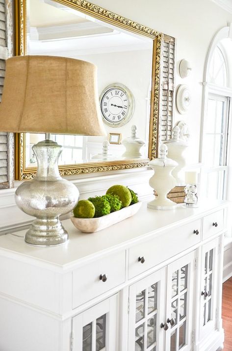 dining room buffet with lamp and dough bowl with textured moss balls Spring Buffet Table Decor, White Sideboard Decor, How To Decorate A Buffet, Sideboard Decor Ideas, Decorating A Buffet, Townhouse Inspiration, Dining Room Buffet Decor, Ideas Decoracion Salon, Farmhouse Accessories