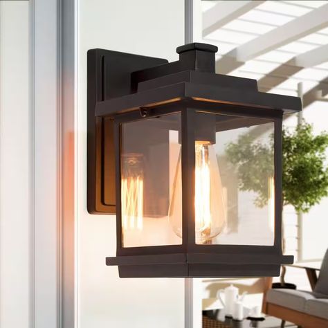 Refresh the look of your outdoor space with Modern Industrial style 1-Light Outdoor Wall Lantern Sconce of Westever Collection. Rectangular framework with a classic earth black finish and clear glass shade infuses vintage charm into any landscape by providing a clear view of the lantern's sleek interior. The unique modern outdoor sconce enhances the versatility of this updated collection. It does wonders in your garden, patio, porch, or any other outdoor space. Outdoor Porch Lights, Exterior Light Fixtures, Black Outdoor Wall Lights, Led Outdoor Wall Lights, Outdoor Sconces, Outdoor Wall Lantern, Outdoor Porch, Barn Lighting, Seeded Glass