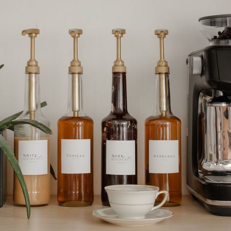 How To Display Coffee Syrups, Coffee Syrup Bottles With Pump, Syrup Bottle Ideas, Coffee Shop Syrup Display, Coffee Syrups Display, Coffee Syrup Station, Shelf Stable Coffee Syrup, Coffee Display Ideas, Coffee Bar Syrup Display