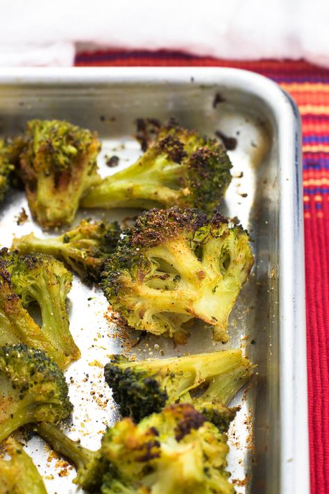 Garlic roasted broccoli with cajun spices is a healthy side dish made even easier by using frozen broccoli. There's no need for thawing in this simple dish. Cajun Spices, Roasted Broccoli Recipe, Garlic Roasted Broccoli, Frozen Frozen, Gluten Free Sides Dishes, Healthy Side Dish, Roasted Vegetable Recipes, Frozen Broccoli, Healthy Side