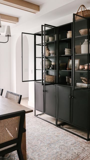 Black Display Cabinet Dining Rooms, Large Dining Room Storage, Dining Room Display Cabinet Modern, Dining Room Display Cabinet Ideas, Black Dining Cabinet, Storage Cabinet Dining Room, Dinning Room Buffet Decor Ideas Modern, Dramatic Dining Room Ideas, Black Hutch Dining Room