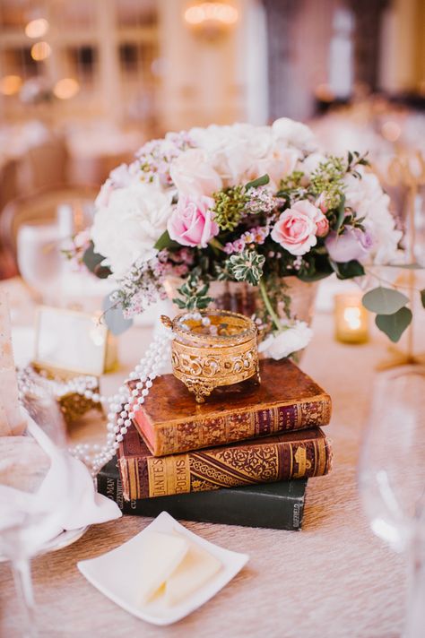 Reception Table Setting Flowers Pearls Vintage Books Candles Opulent Pink Gold Victorian Wedding in Seattle http://www.barrieannephotography.com/ Wedding Table Decorations White, Victorian Wedding Decor, Victorian Theme Party, Gold Table Settings, Victorian Style Wedding, Gold Table Setting, Book Centerpieces, Reception Table Settings, Literary Wedding