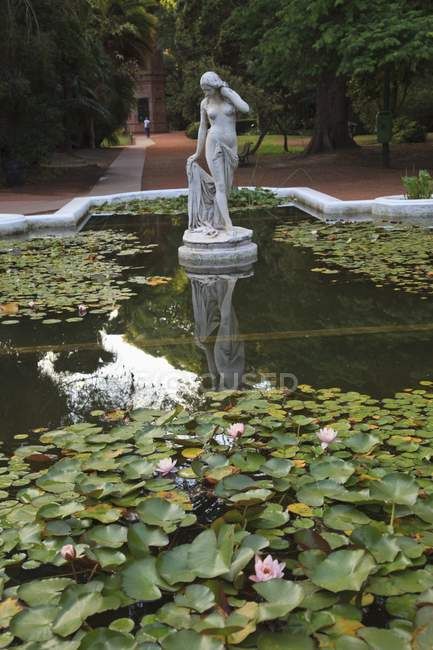 Statue In A Pond In The Palermo Botanical Gardens — nature, jardin botanical - Stock Photo | #164920586 Greek Statue Garden Aesthetic, Pond Statues, Statue In Garden, Aesthetic Fountain, Beautiful Fountains, Fountain Statue, Statue Fountain, Greek Paintings, Outdoor Ponds