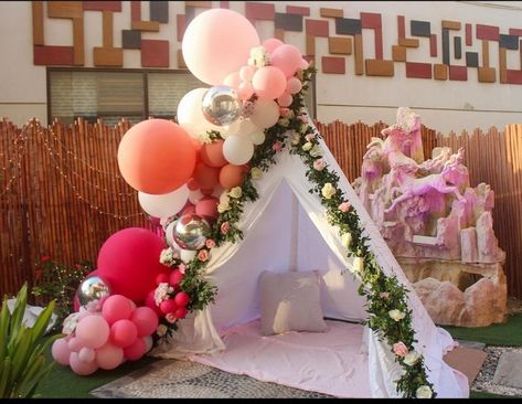 Balloons and flowers making the most perfect combination on a teepee tent making it look even more pretty! Visit our website for more! bazzle.pk/?v=d71bdd22c8bb Teepee Tent Birthday Decorations, Birthday Tent Decor, Decoration Ideas For Birthday, Outdoor Birthday Party Decorations, Diy Teepee Tent, Picnic Business, Balloons And Flowers, 1st Birthday Boy Themes, Half Birthday Baby