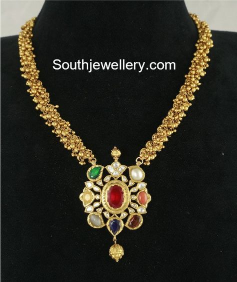 22 carat gold antique finish muvvalu necklace with navratna pendant by Tibarumal Ramnivas jewellers. gold haram models, indian jewellery designs, gold necklace designs 2018 Navratna Pendant, Navratna Jewellery, Navaratna Jewellery, Gem Necklaces, Ruby Necklace Designs, Gold Haram, Temple Jewelry Necklace, Small Pendants, Gold Jewelry Outfits