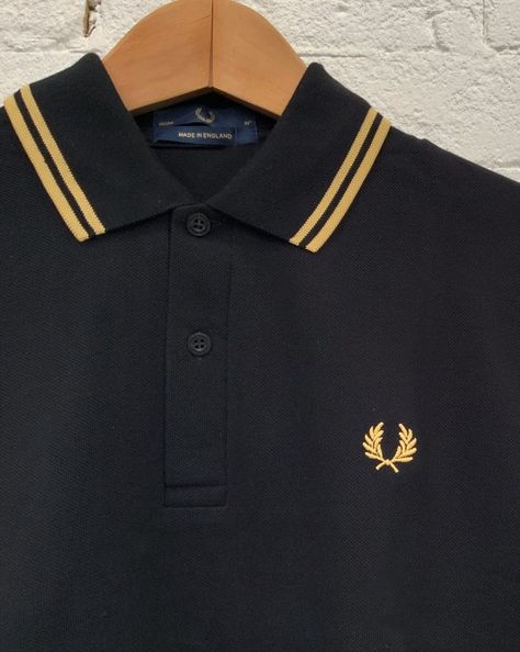 A detailed look into the iconic Fred Perry M12 Polo Shirt online at Stuarts London Fred Perry Polo Shirts, Fred Perry Polo, Stetson Hat, Protective Clothing, Shirt Online, Polo Shirt, London