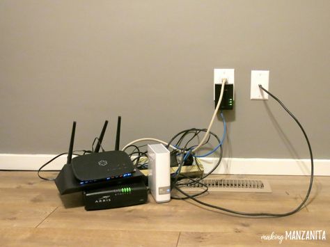 Cords are a huge eye sore, right? If you’re looking for a simple way to hide cords, this one’s for you. Here’s how to hide router cords with a mid-century side table. There is nothing more hideous than a huge pile of cords in a beautifully decorated room. You spend all of your time and ... Read More about  How To Hide Router Cords With A Mid-Century Side Table Hiding Internet Modem Living Rooms, Ways To Hide Internet Router, Hide Modem And Router, Diy Hide Tv Cords, Lego Doll House, Hide Modem, Electrical Cord Covers, Hide Electrical Cords, Hide Tv Cords